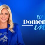 Mara Venier accanto al marchio della cinquantesima edizione di Domenica In