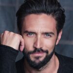 Alex Belli nel visual ufficiale del Grande Fratello Vip 9